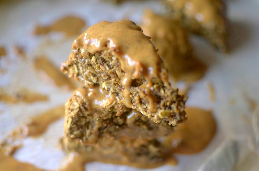 Two peanut butter scones with a peanut butter drizzle
