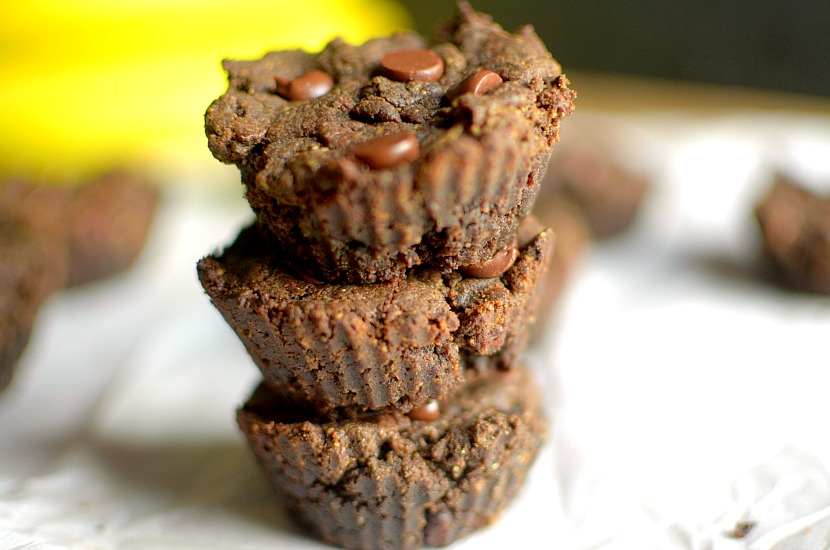 Stack of three flourless chocolate peanut butter muffins