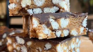 Stack of three peanut butter protein crunch bars