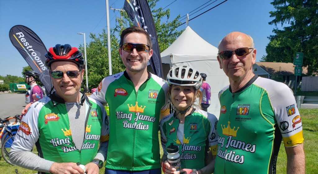 Group shot of 4 King James Buddies riders after completing the Best Buddies Challenge