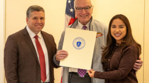 Senator Sal DiDomenico, Mark Hintlian, and State Rep. Judith Garcia holding the official citation