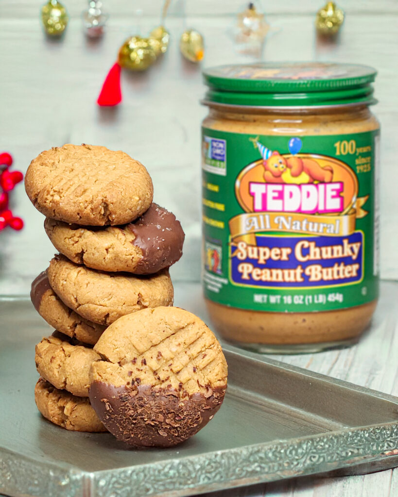Stack of peanut butter cookies on a holiday serving tray.